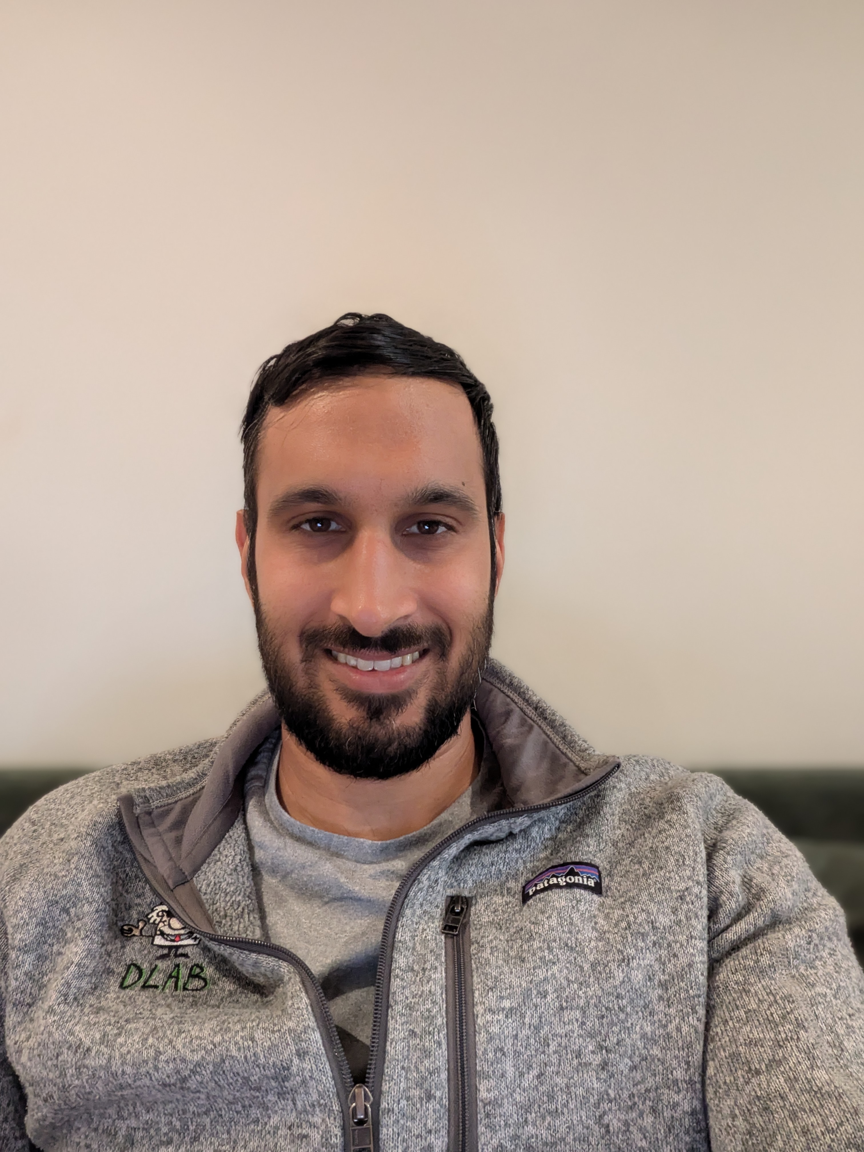 Suraj, breathwork facilitator, in a calm natural portrait